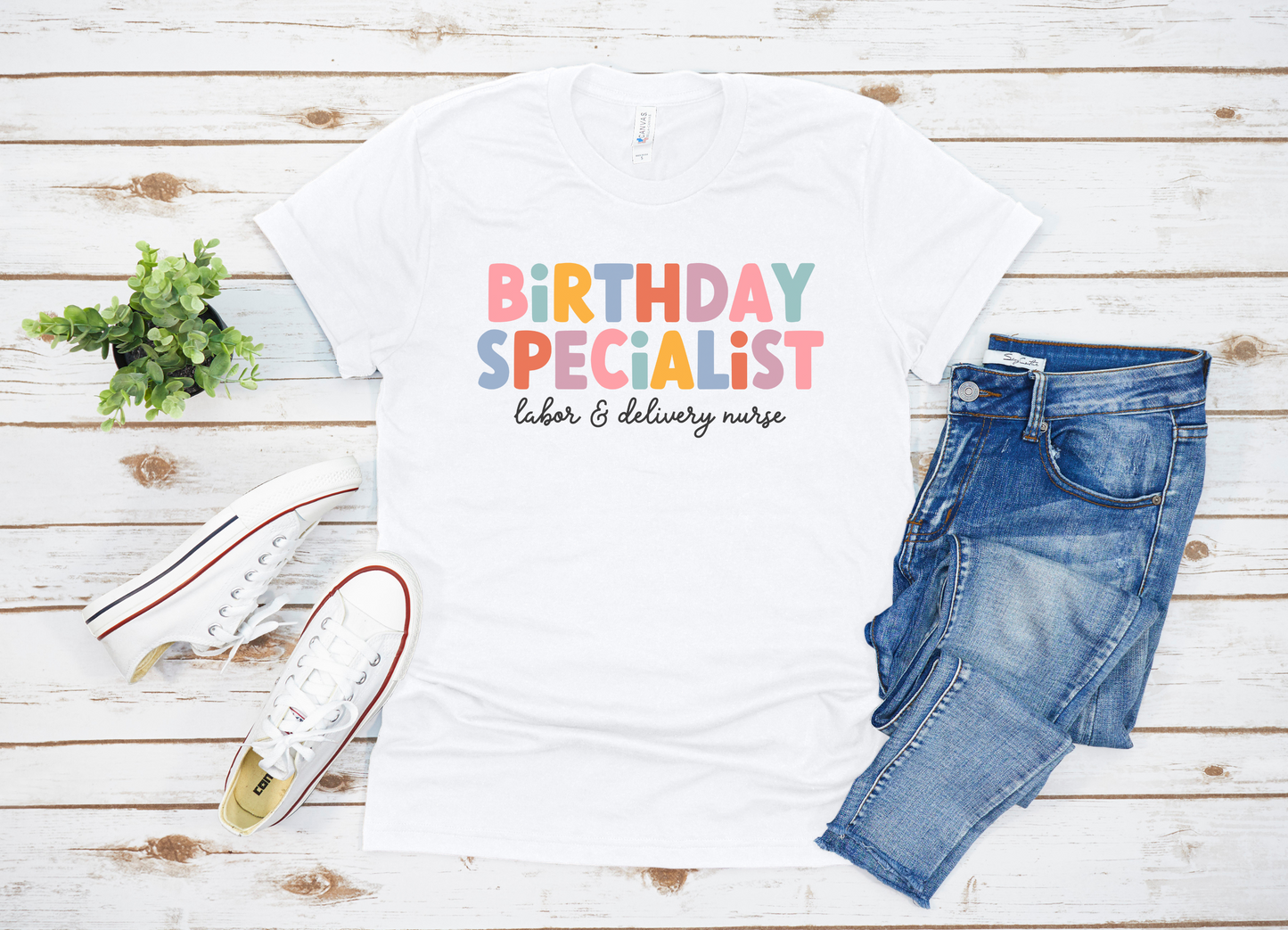 white "birthday specialist" labor and delivery nurse t-shirt