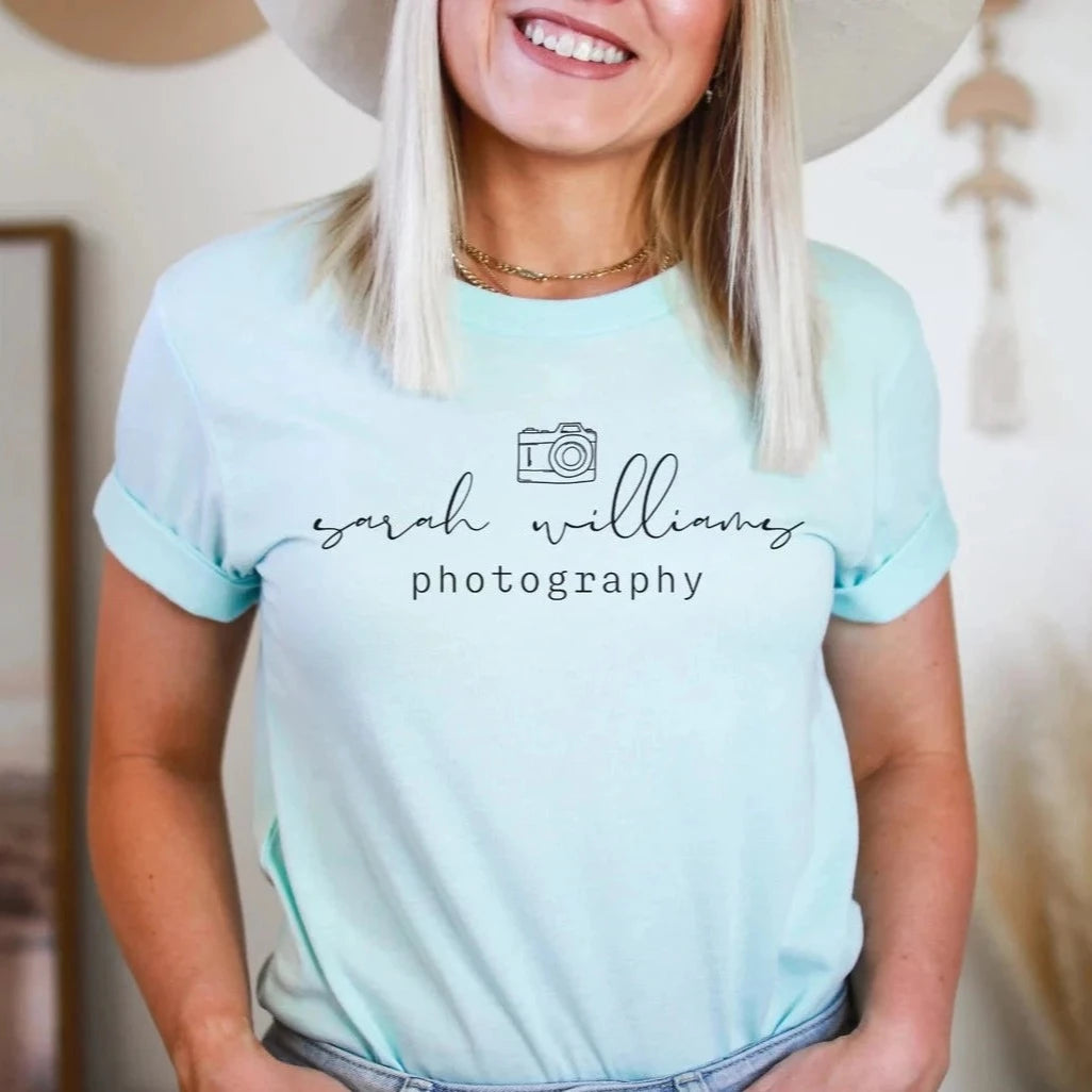 custom photographer t-shirt with camera icon in light blue