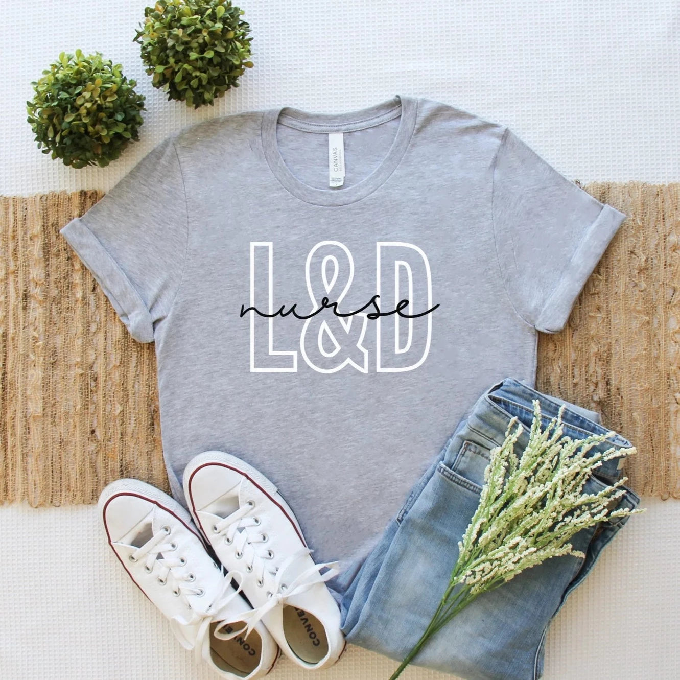 ash grey L&D nurse t-shirt with block and cursive text