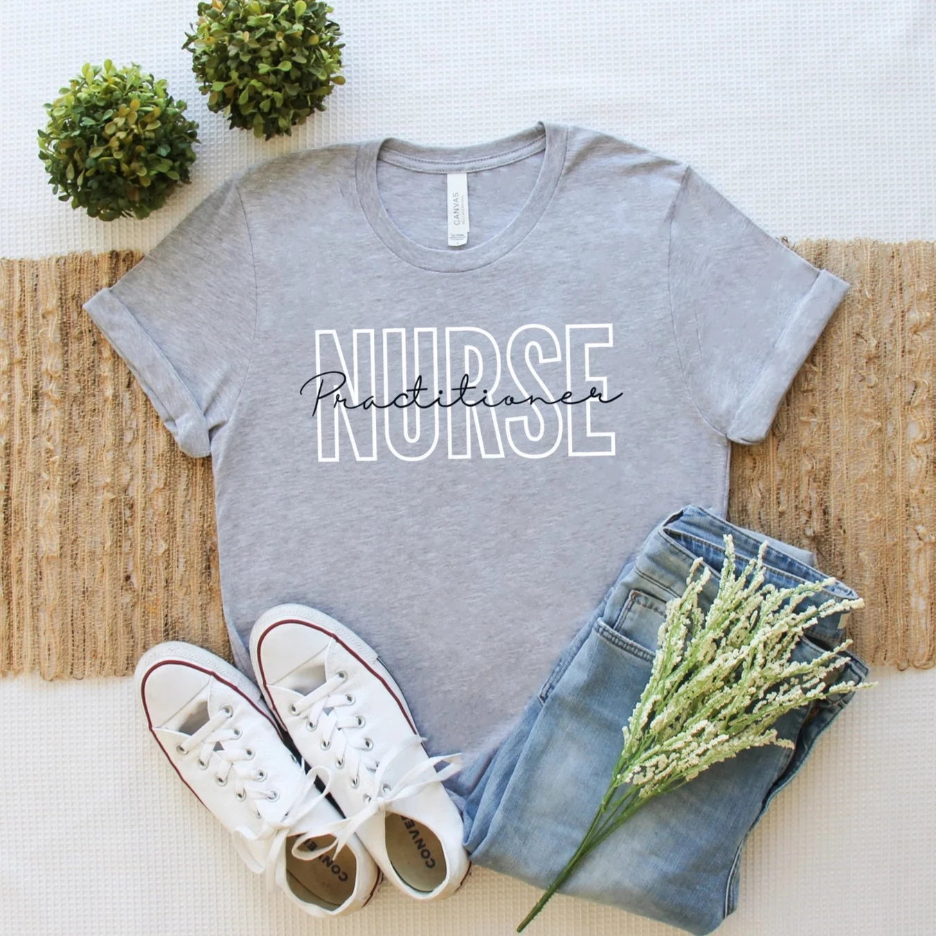 ash grey nurse practitioner t-shirt with block and cursive text