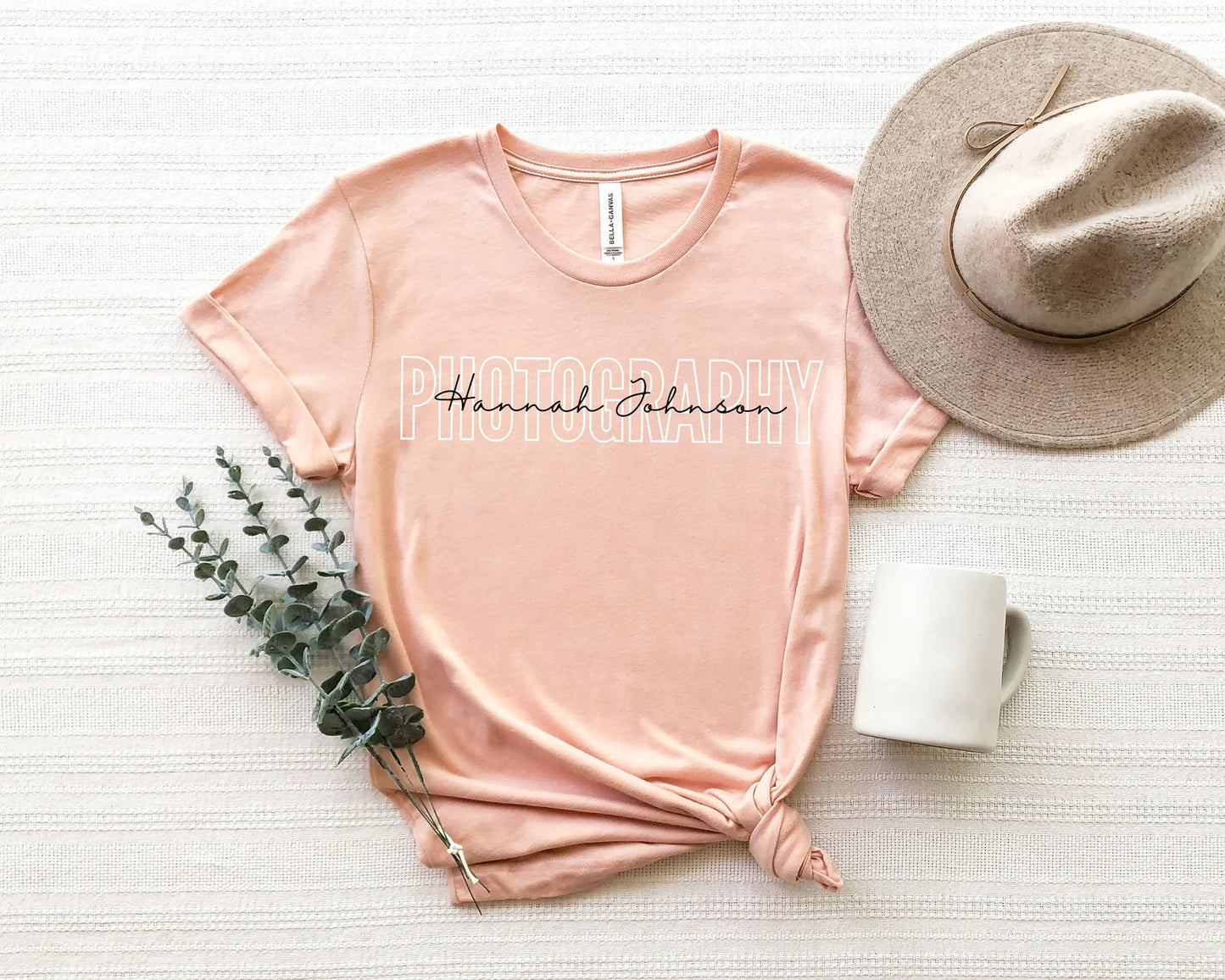 heather peach custom photographer t-shirt with block and cursive text
