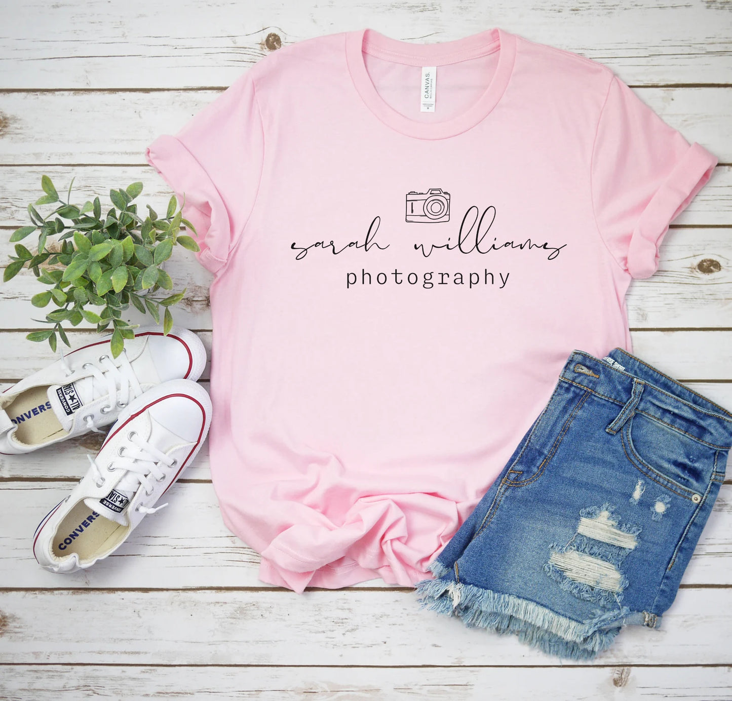 custom photographer t-shirt with camera icon in light pink