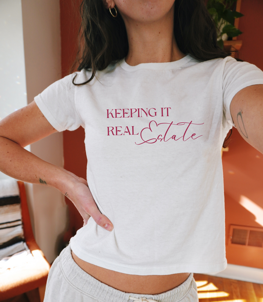 Keeping It Real Estate Baby Tee