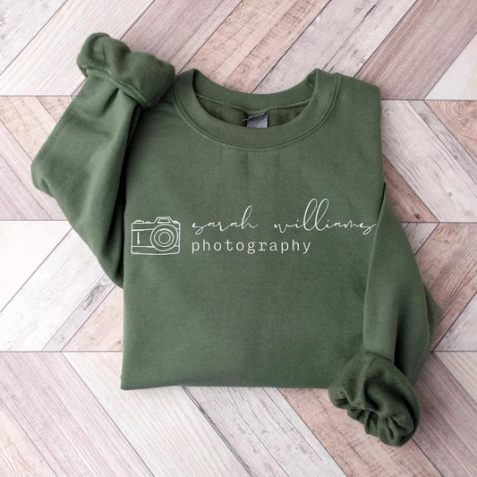 custom photographer sweatshirt with camera icon in military green