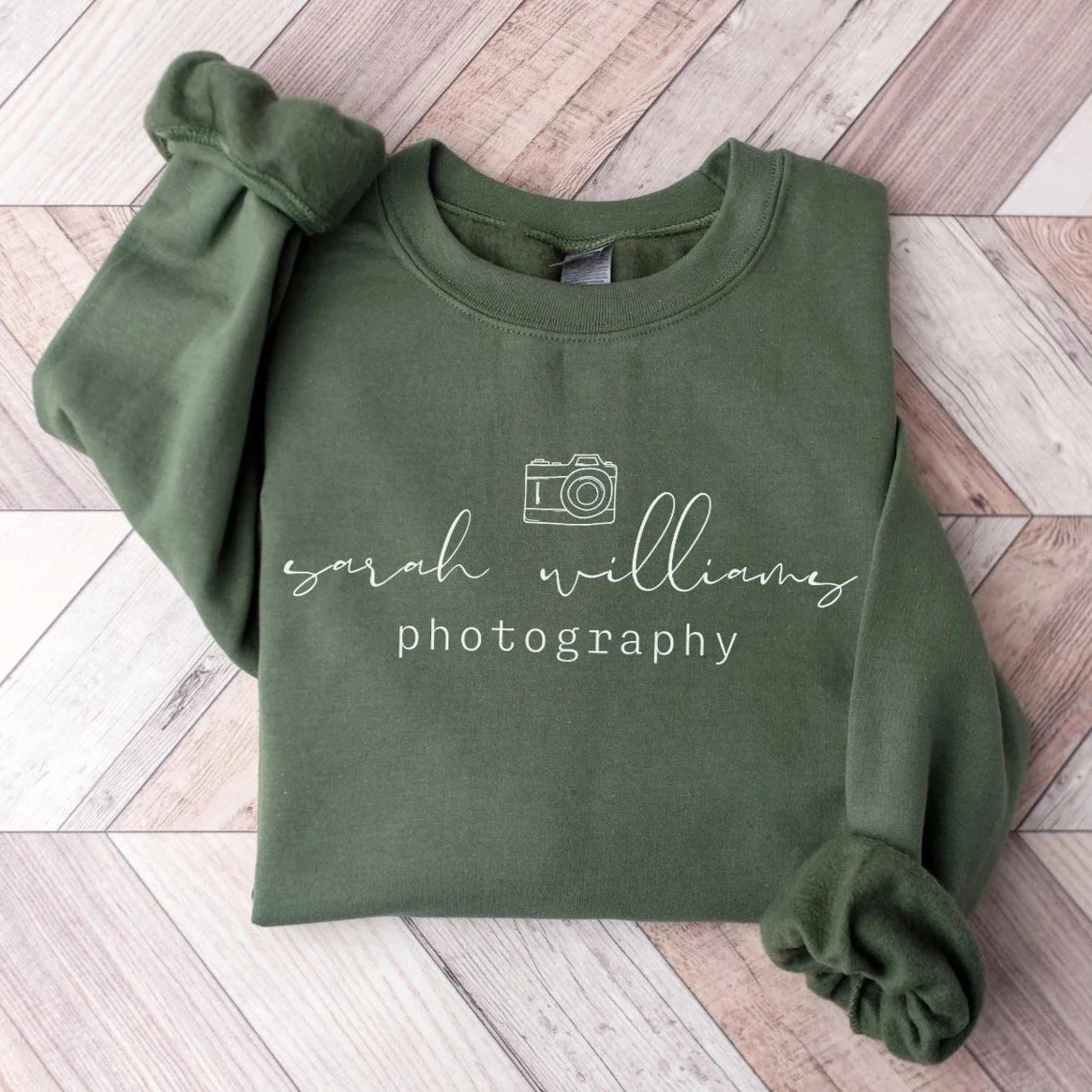 custom photographer sweatshirt with camera icon in military green