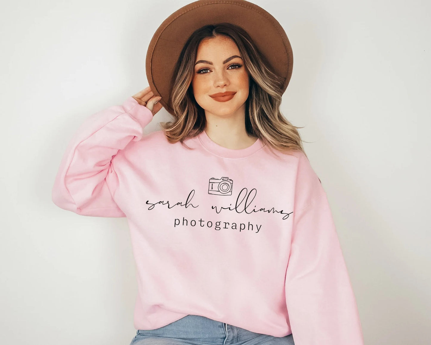 custom photographer sweatshirt with camera icon in pink