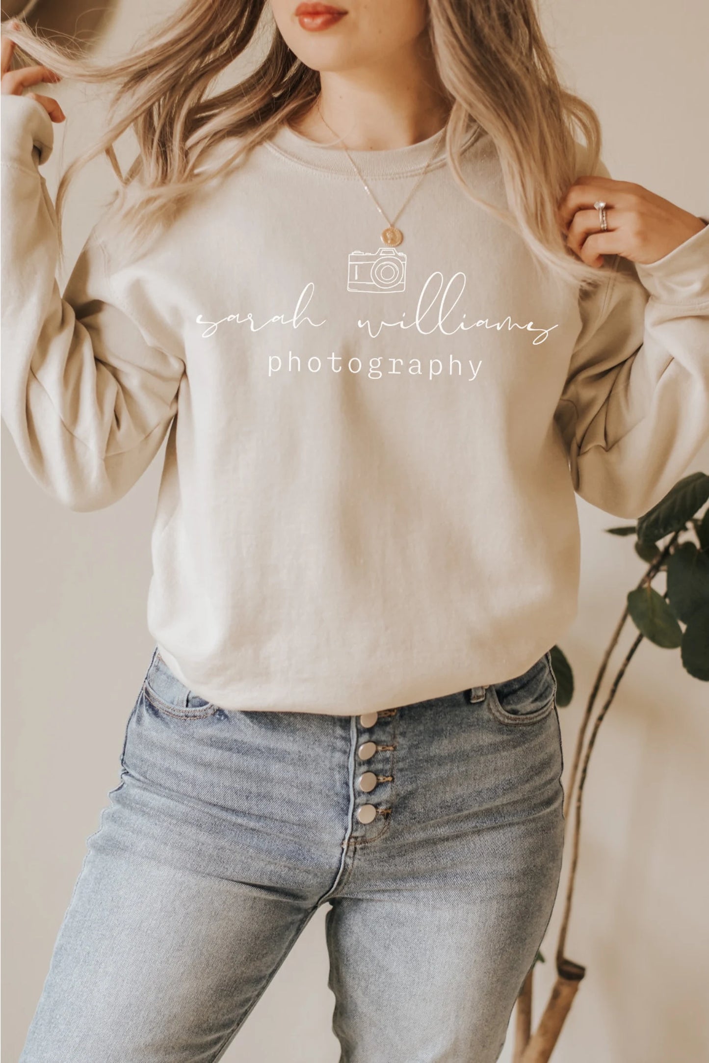 custom photographer sweatshirt with camera icon in tan